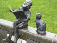 Girl Reading to Her Cat Statue, Longview Public Library, Longview Washington